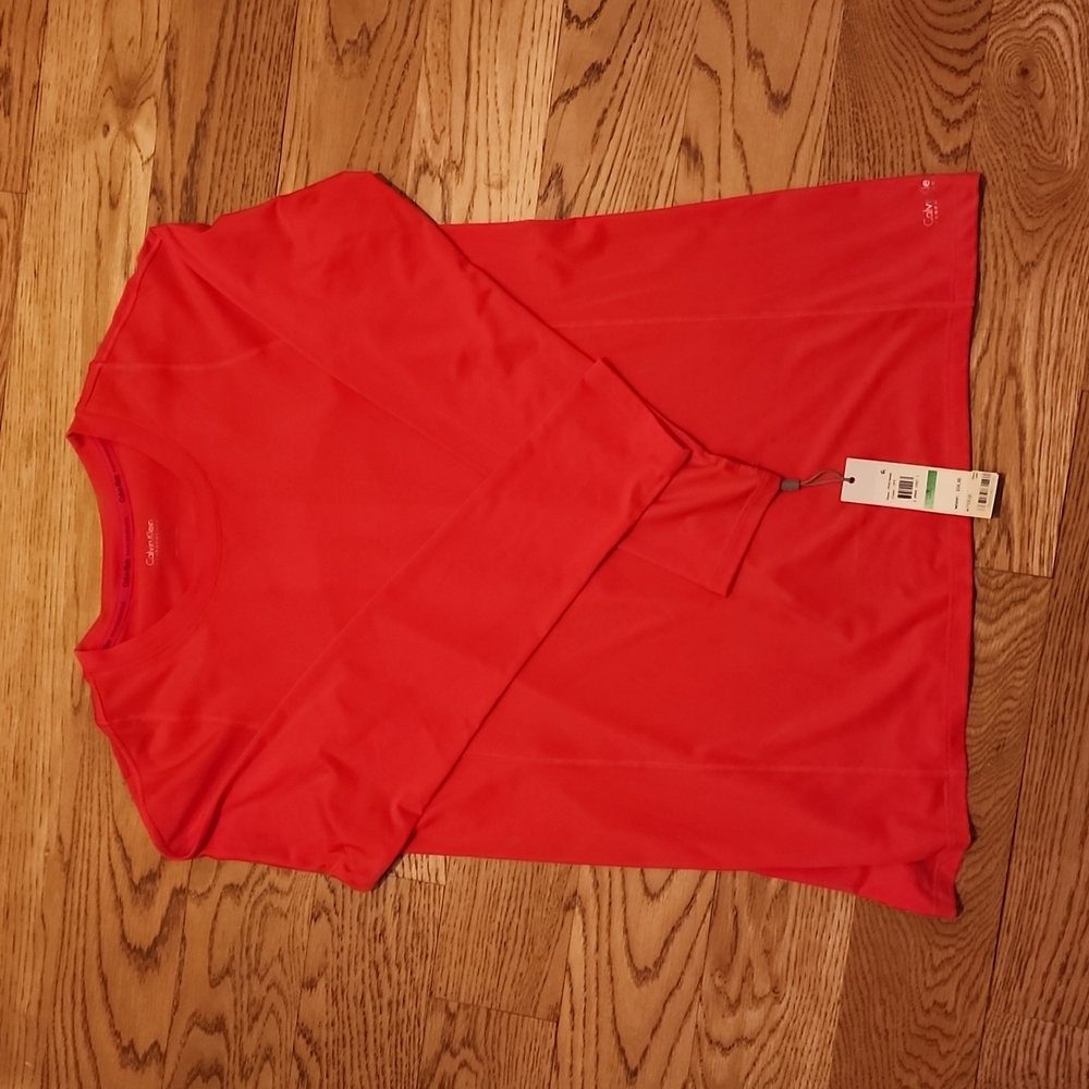 NWOT. Women's Calvin Klein performance long sleeve t-shirt. Size L.